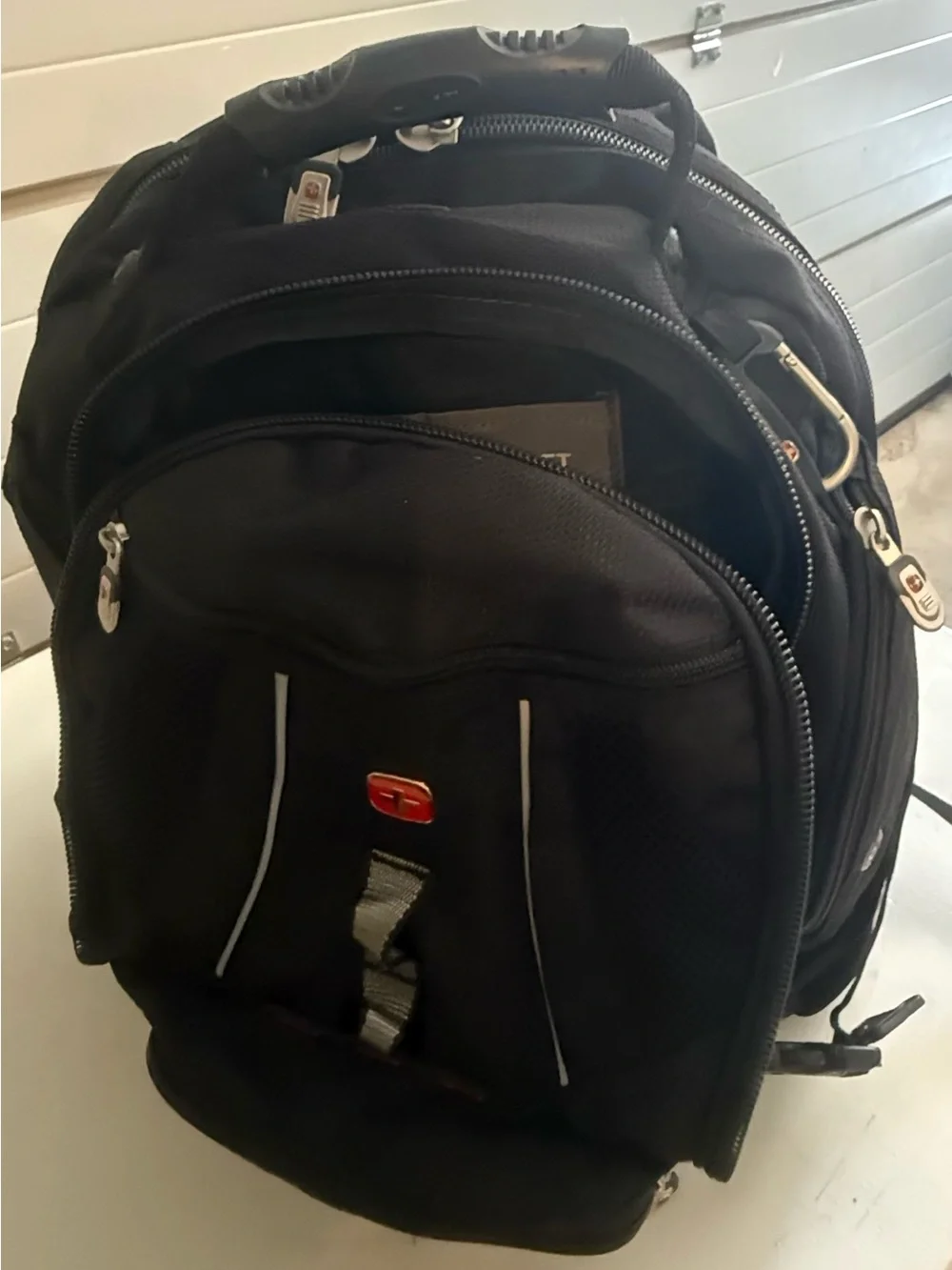 Swiss Gear Black Men’s Travel Backpack with Red Cross Accent